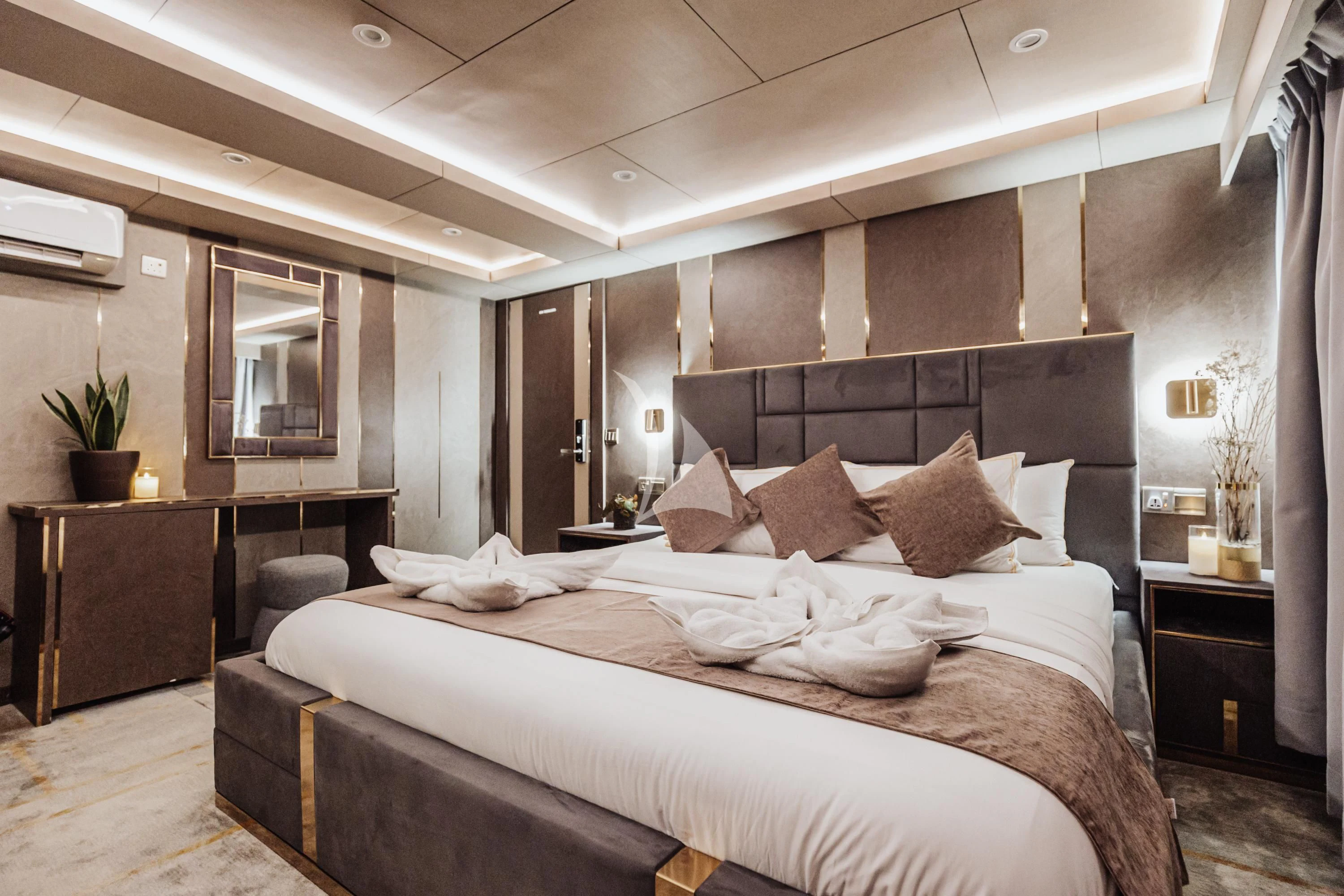 a large bed in a room aboard ARK NOBLE Yacht for Sale