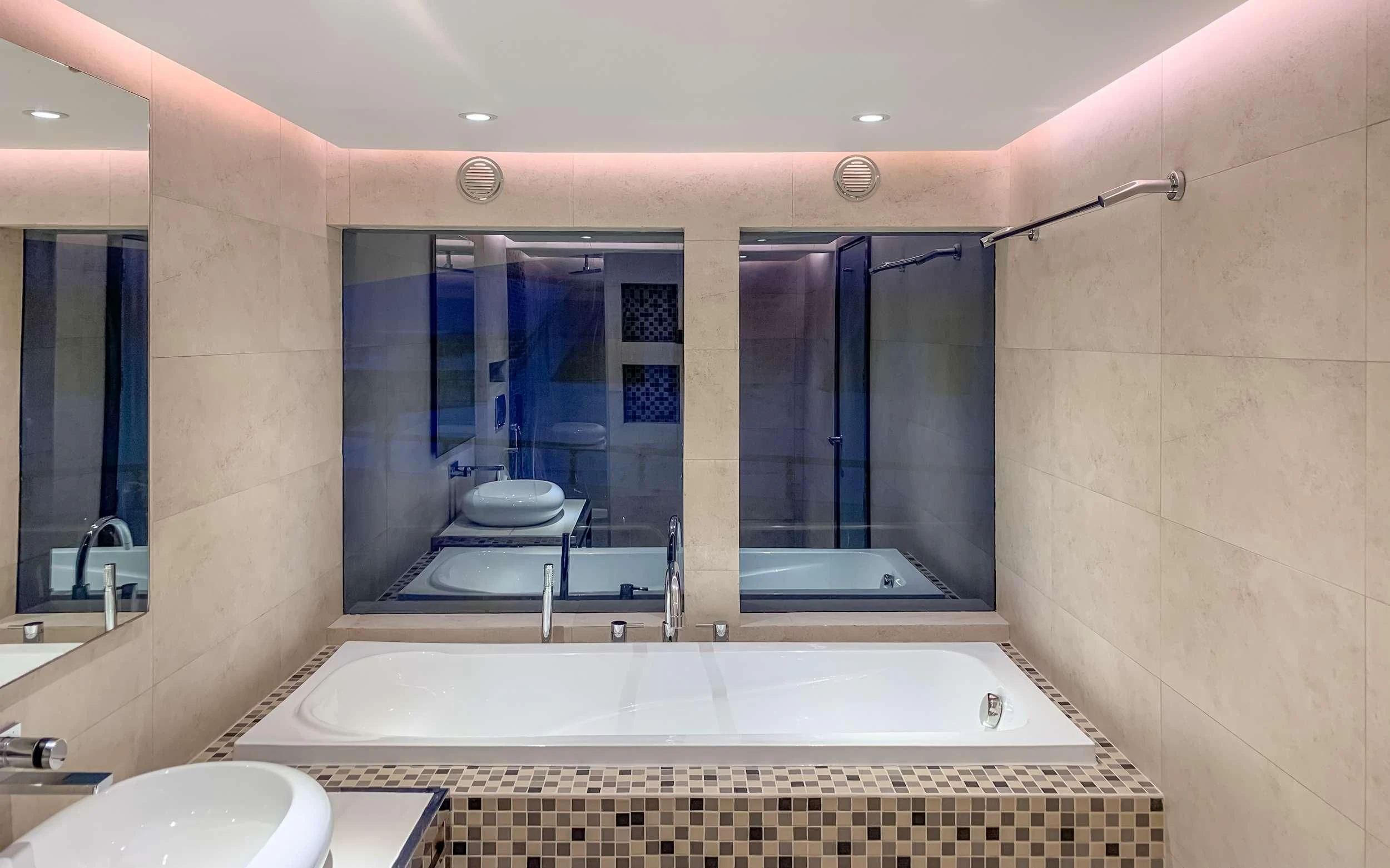 a bathroom with a large tub aboard ARK NOBLE Yacht for Sale