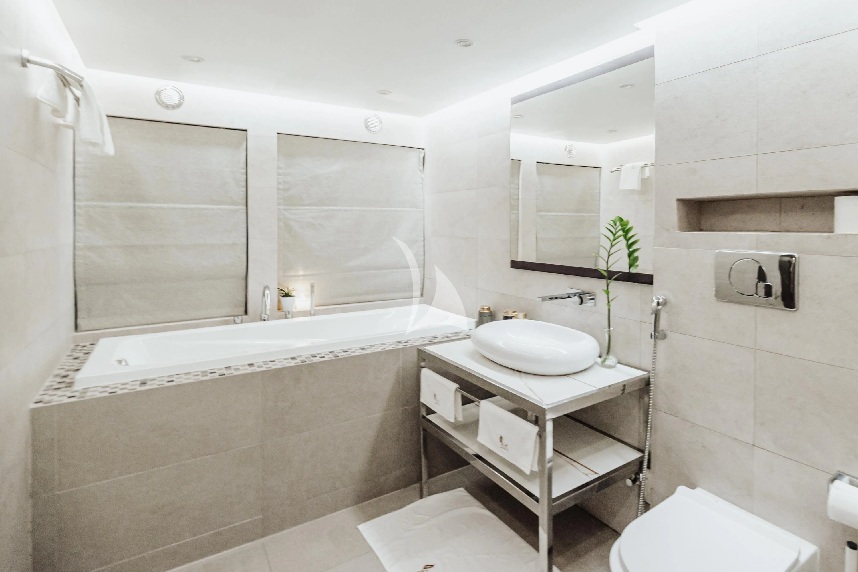 a bathroom with a sink and a bathtub aboard ARK NOBLE Yacht for Sale
