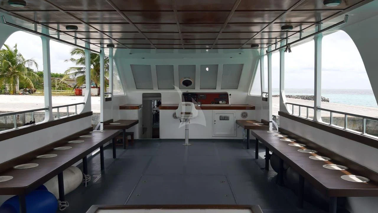 a room with tables and chairs aboard ARK NOBLE Yacht for Sale