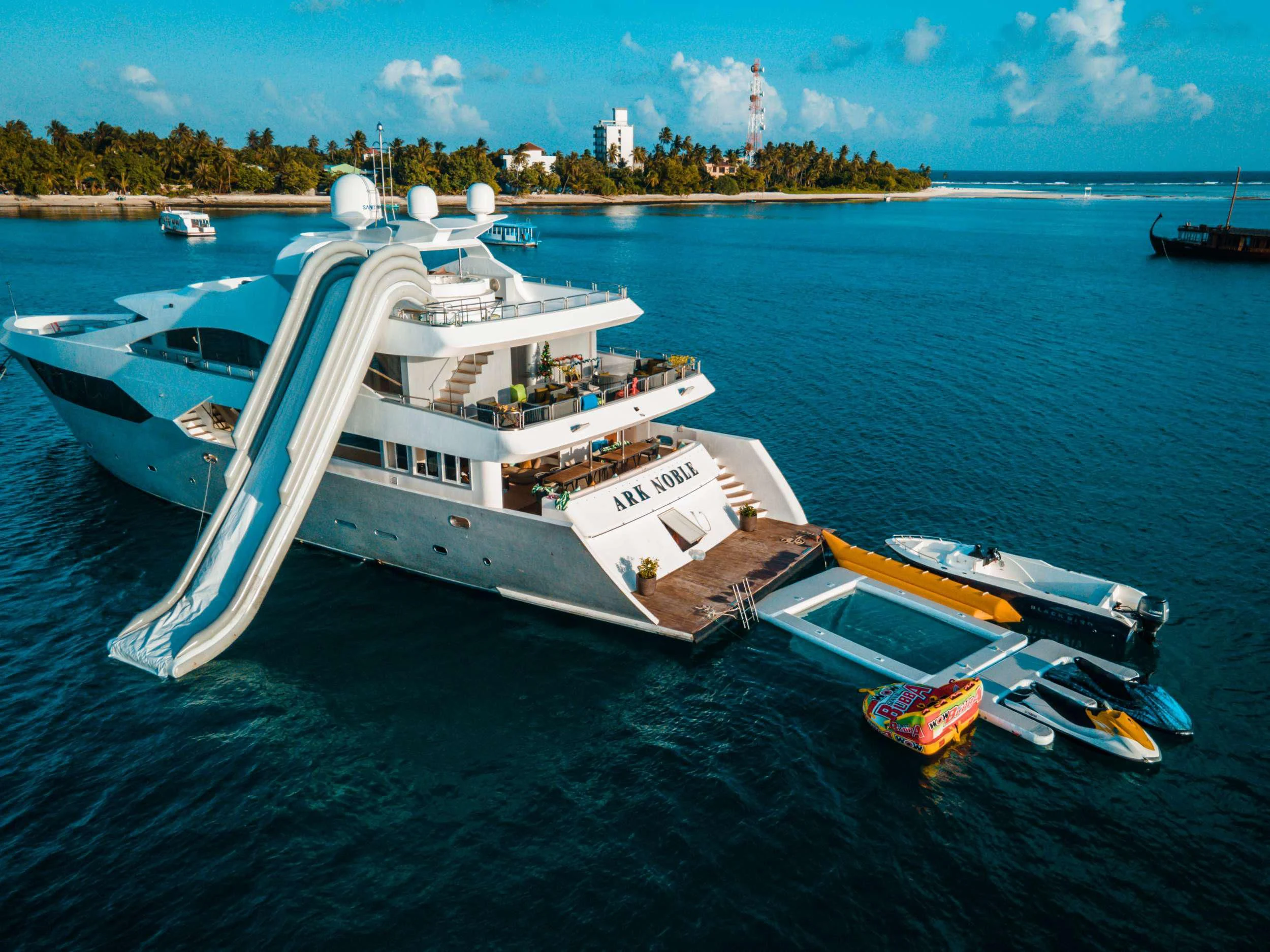 a large white boat on the water aboard ARK NOBLE Yacht for Sale