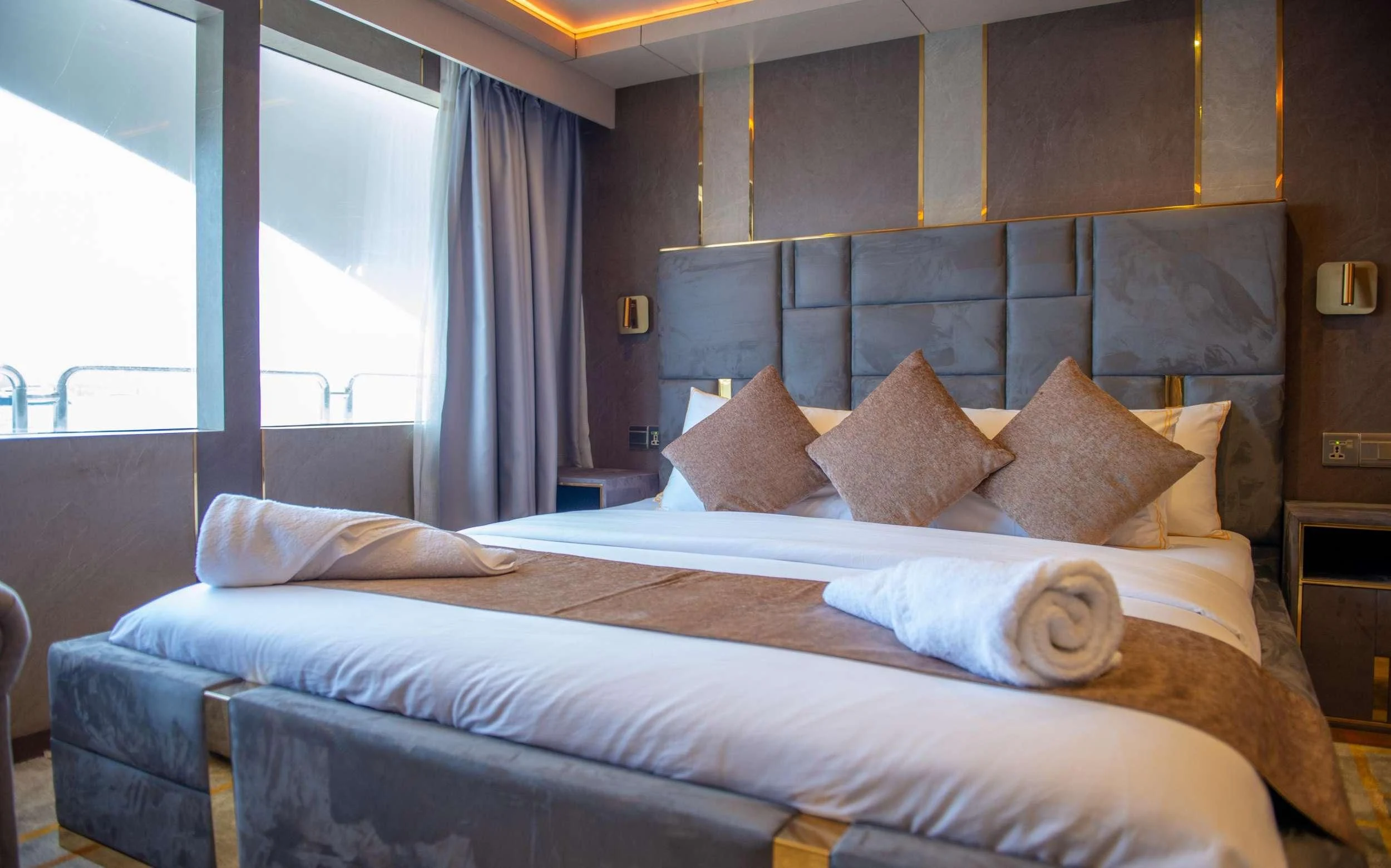 a bed with pillows aboard ARK NOBLE Yacht for Sale