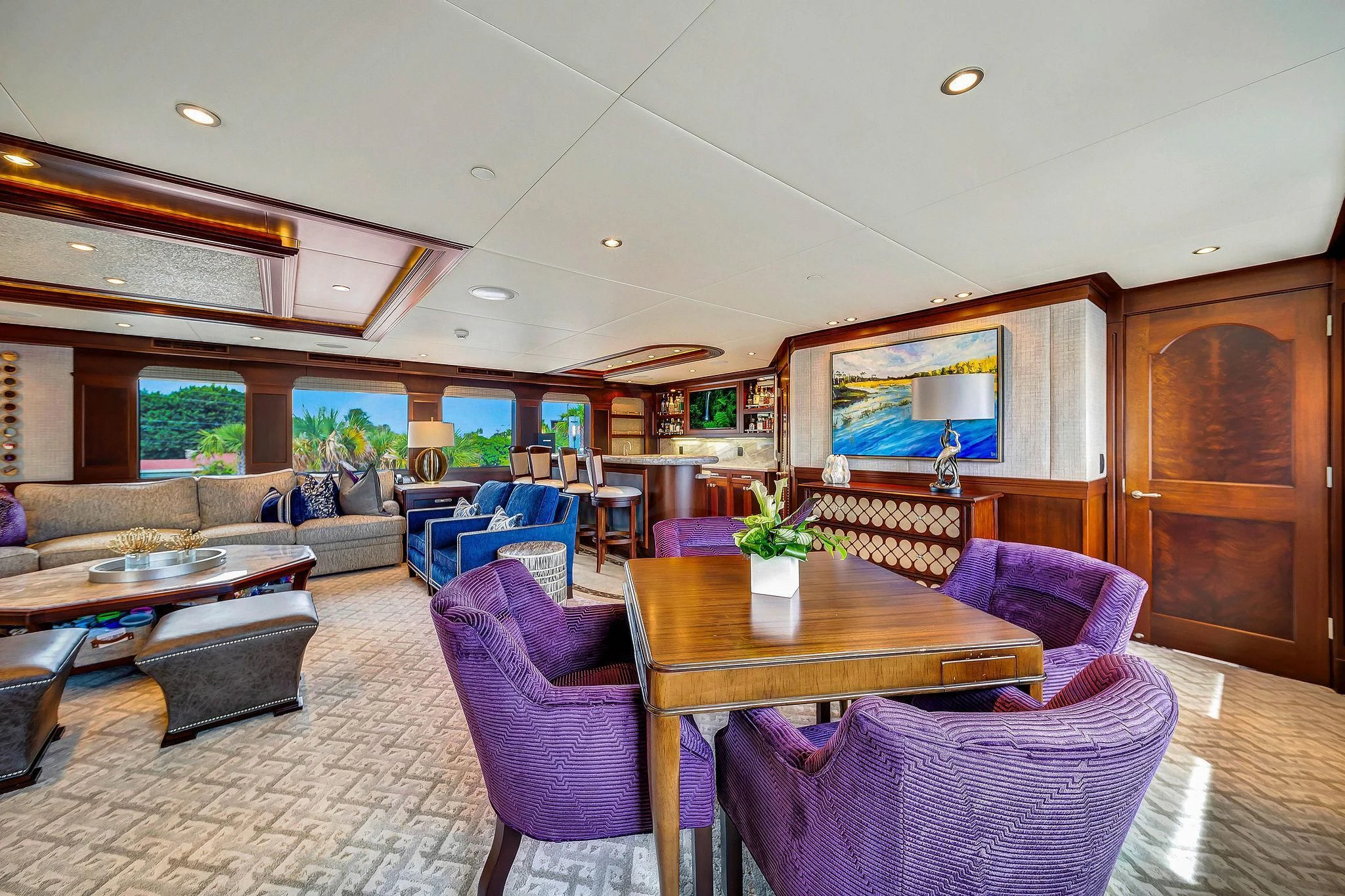 a living room with a table and chairs aboard VALHALLA Yacht for Sale