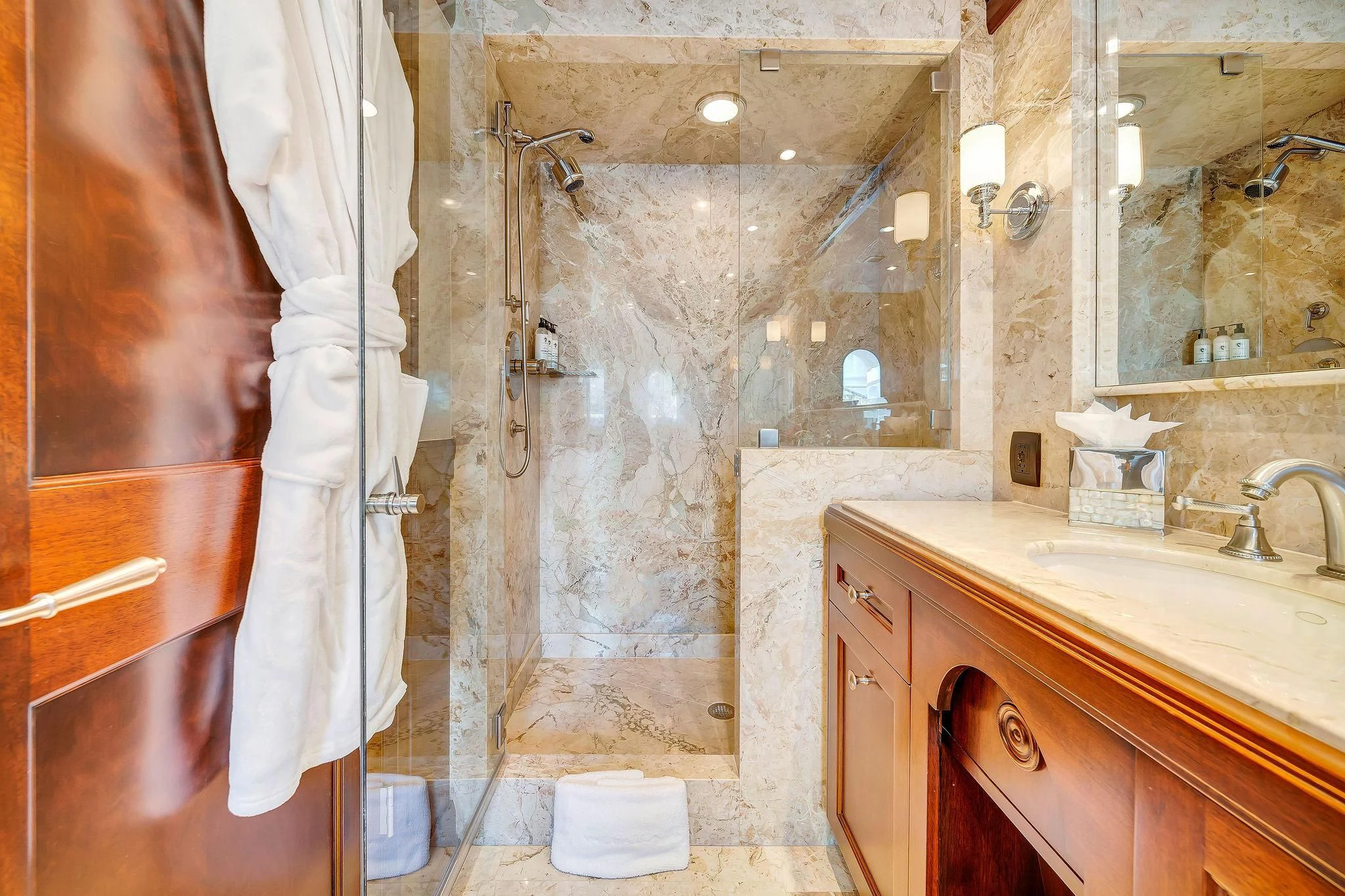 a bathroom with a shower and sink aboard VALHALLA Yacht for Sale