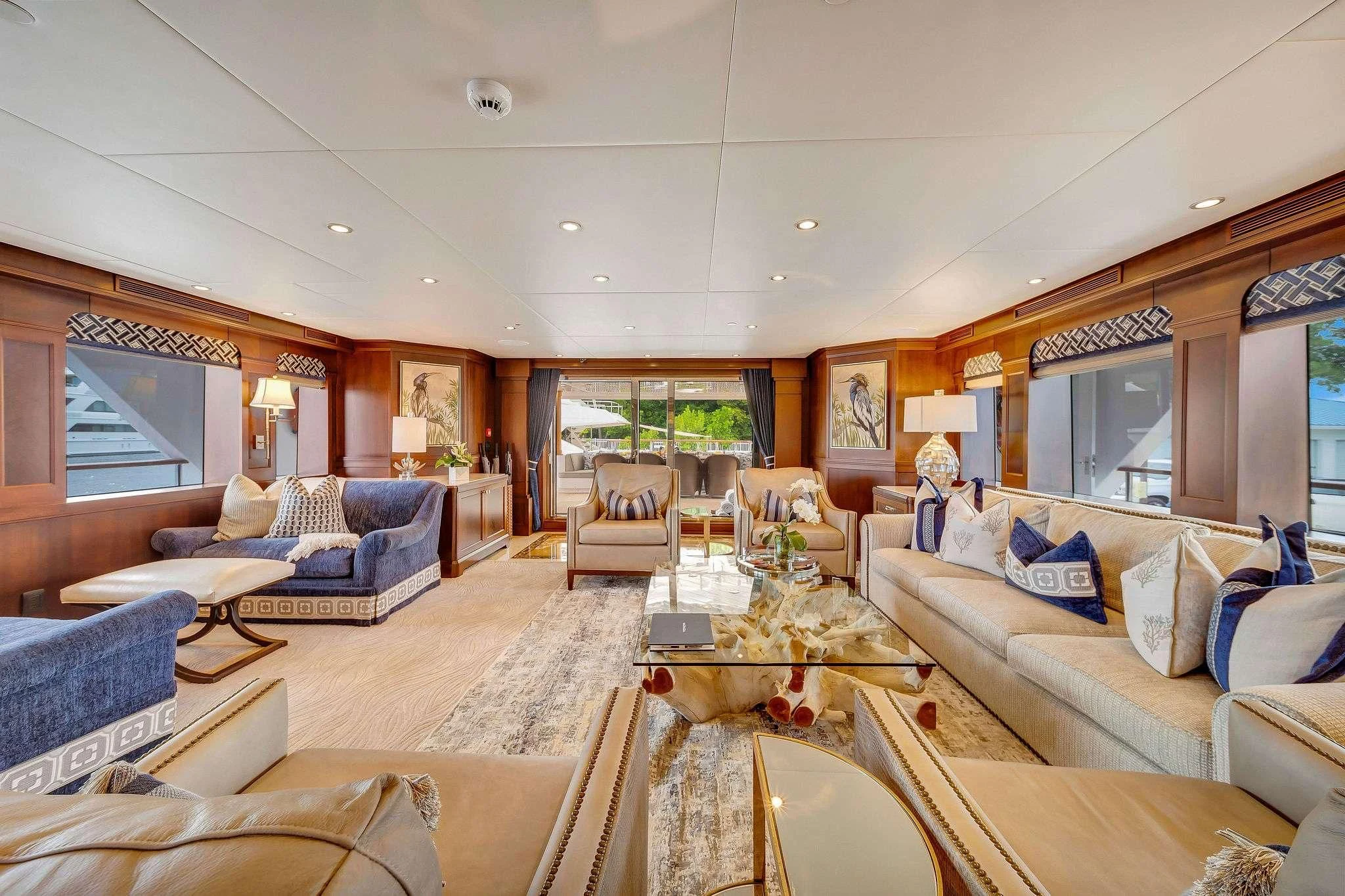 a living room with a large open window aboard VALHALLA Yacht for Sale