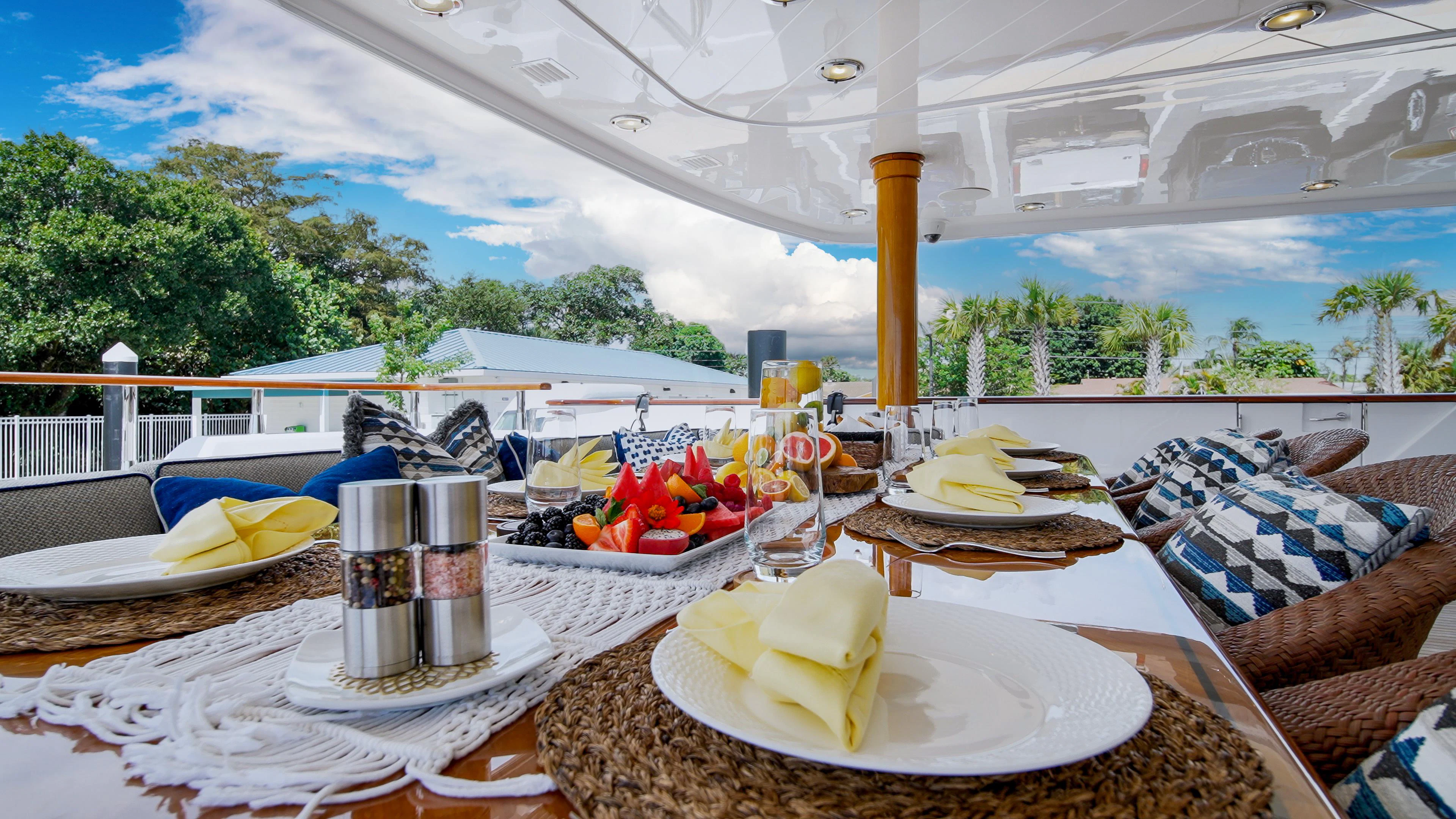 a table with plates and food on it aboard VALHALLA Yacht for Sale