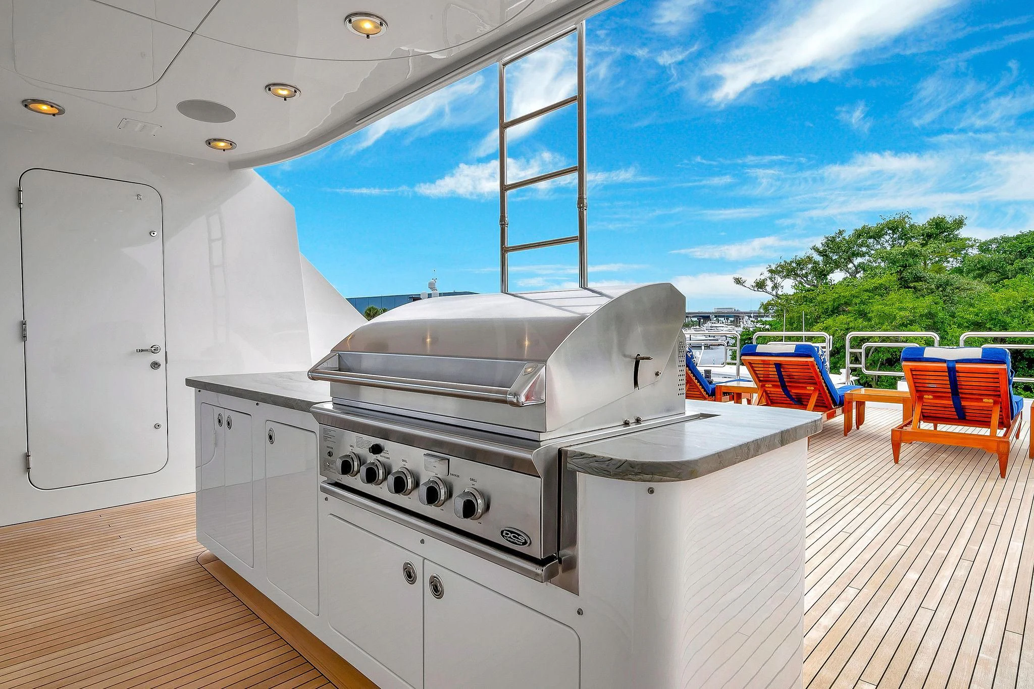a large white kitchen with a large window aboard VALHALLA Yacht for Sale