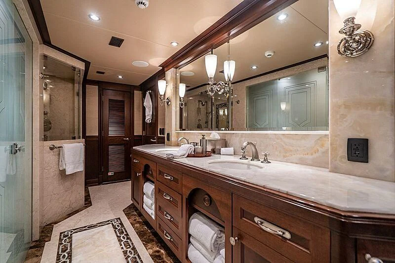 a bathroom with a large mirror aboard VALHALLA Yacht for Sale