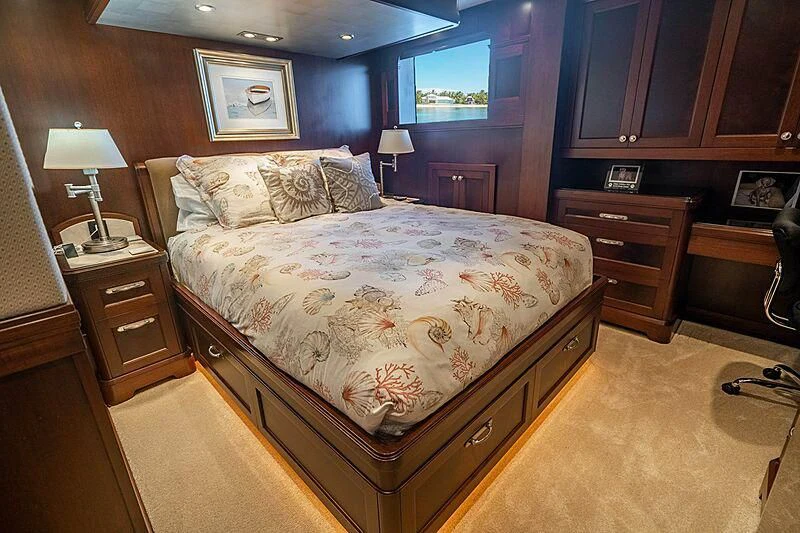 a bedroom with a large bed aboard VALHALLA Yacht for Sale
