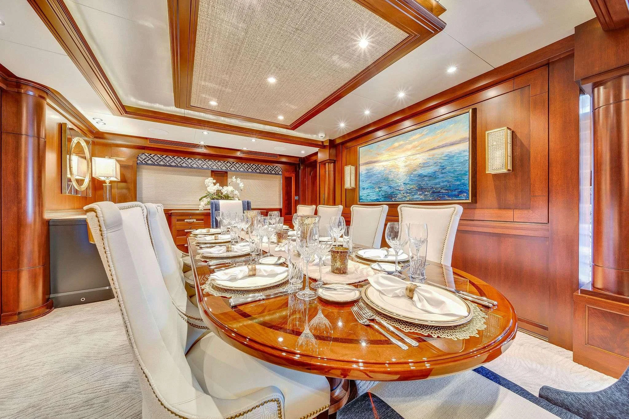 a dining table set for a dinner aboard VALHALLA Yacht for Sale