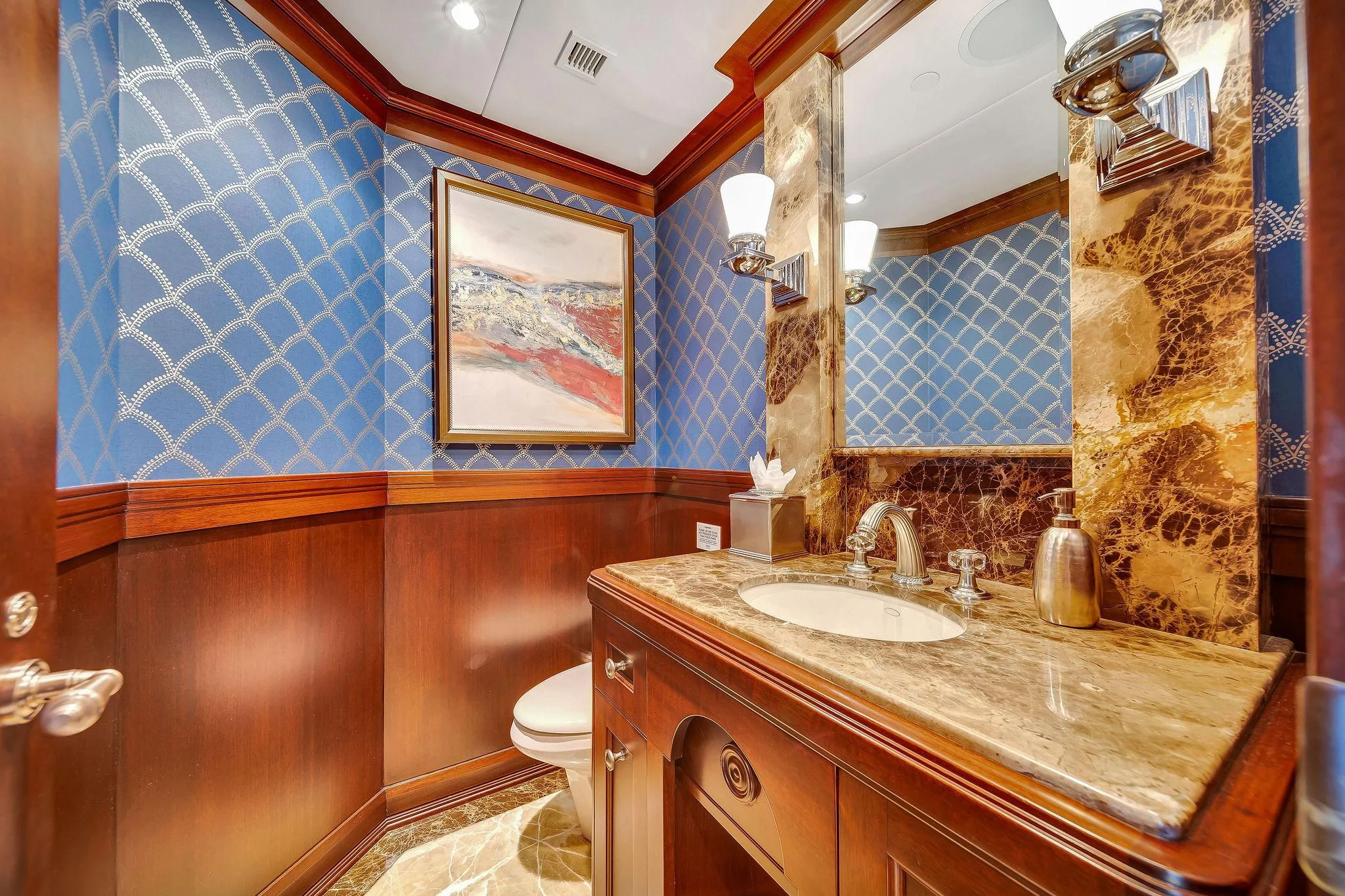 a bathroom with a countertop sink and a mirror aboard VALHALLA Yacht for Sale