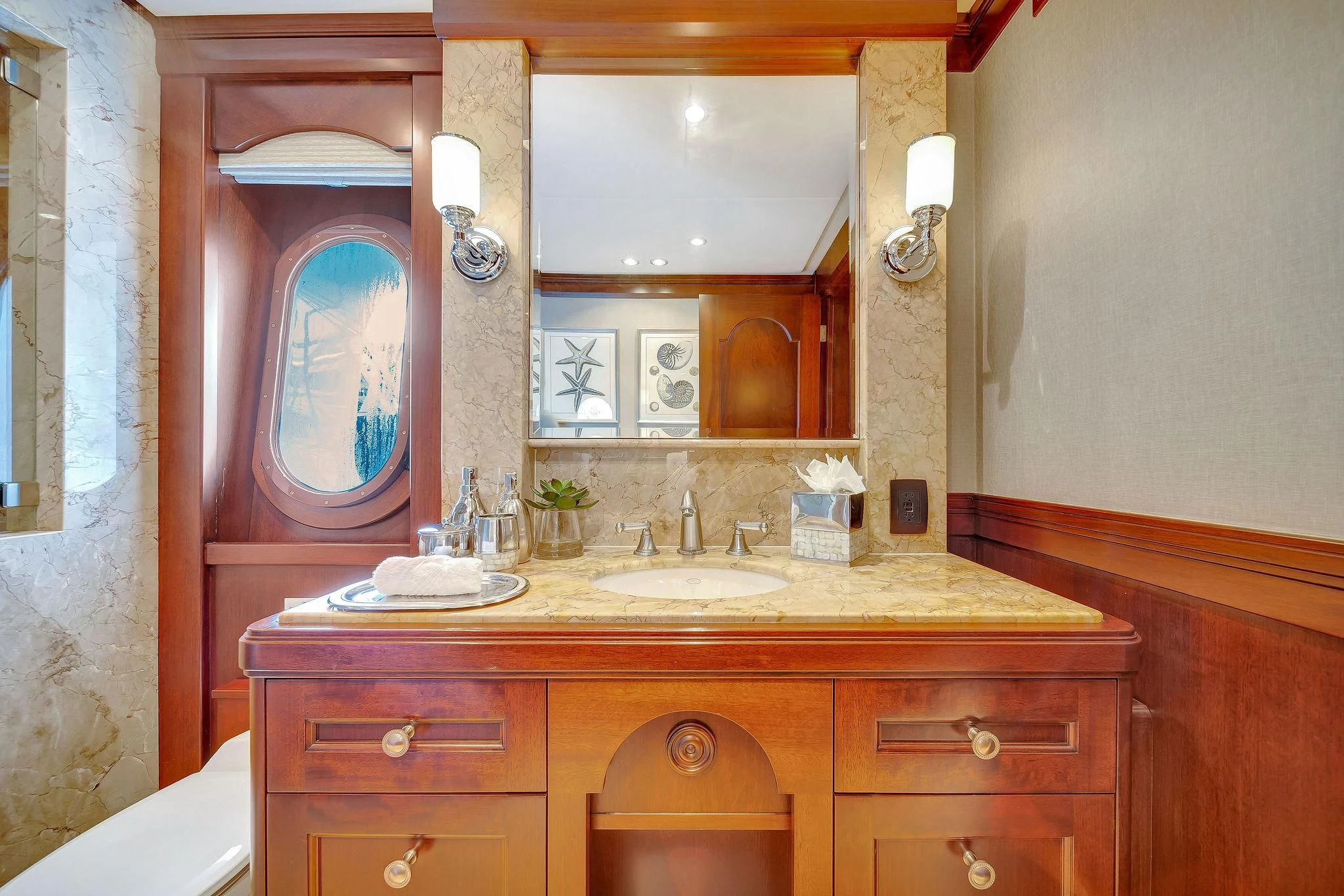 a bathroom with a sink and a mirror aboard VALHALLA Yacht for Sale