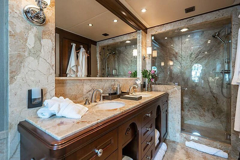 a bathroom with a large mirror aboard VALHALLA Yacht for Sale