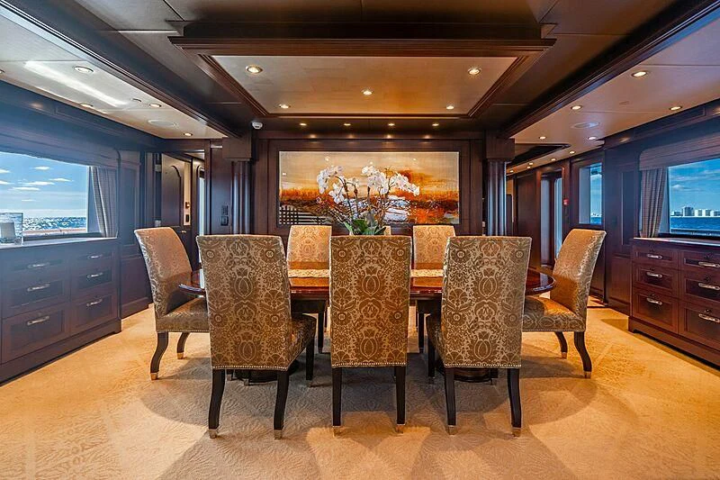 a table and chairs in a room aboard VALHALLA Yacht for Sale