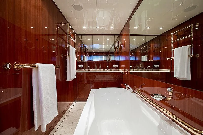 a bathroom with a bathtub and shower aboard KIDI ONE Yacht for Sale