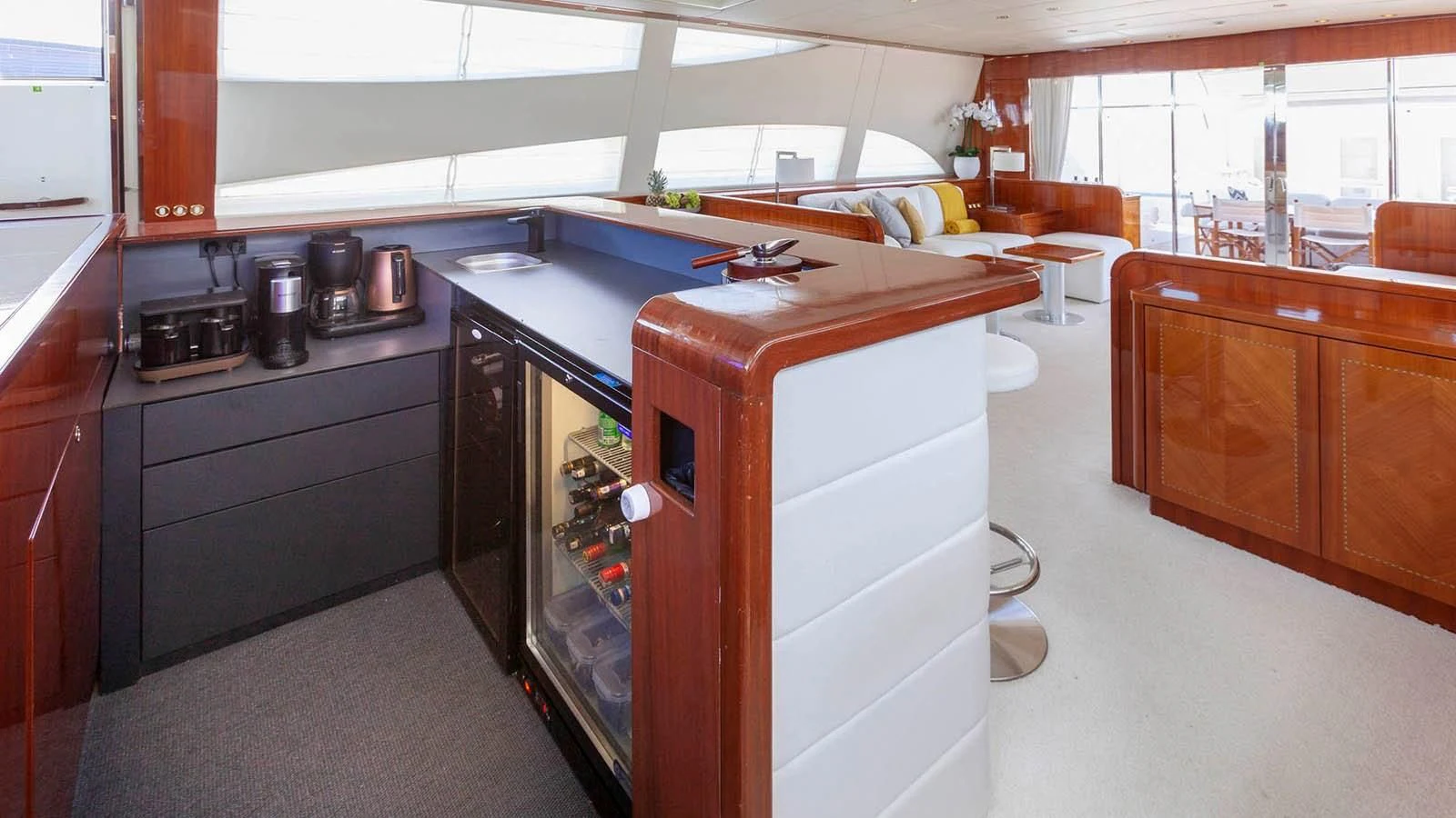 a kitchen with a stove and cabinets aboard KIDI ONE Yacht for Sale
