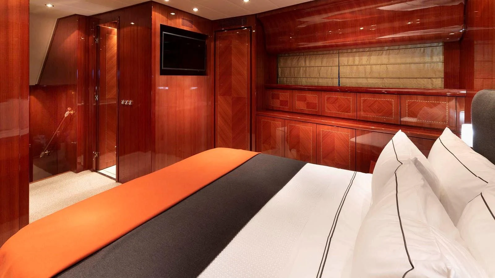 a bed with white sheets aboard KIDI ONE Yacht for Sale