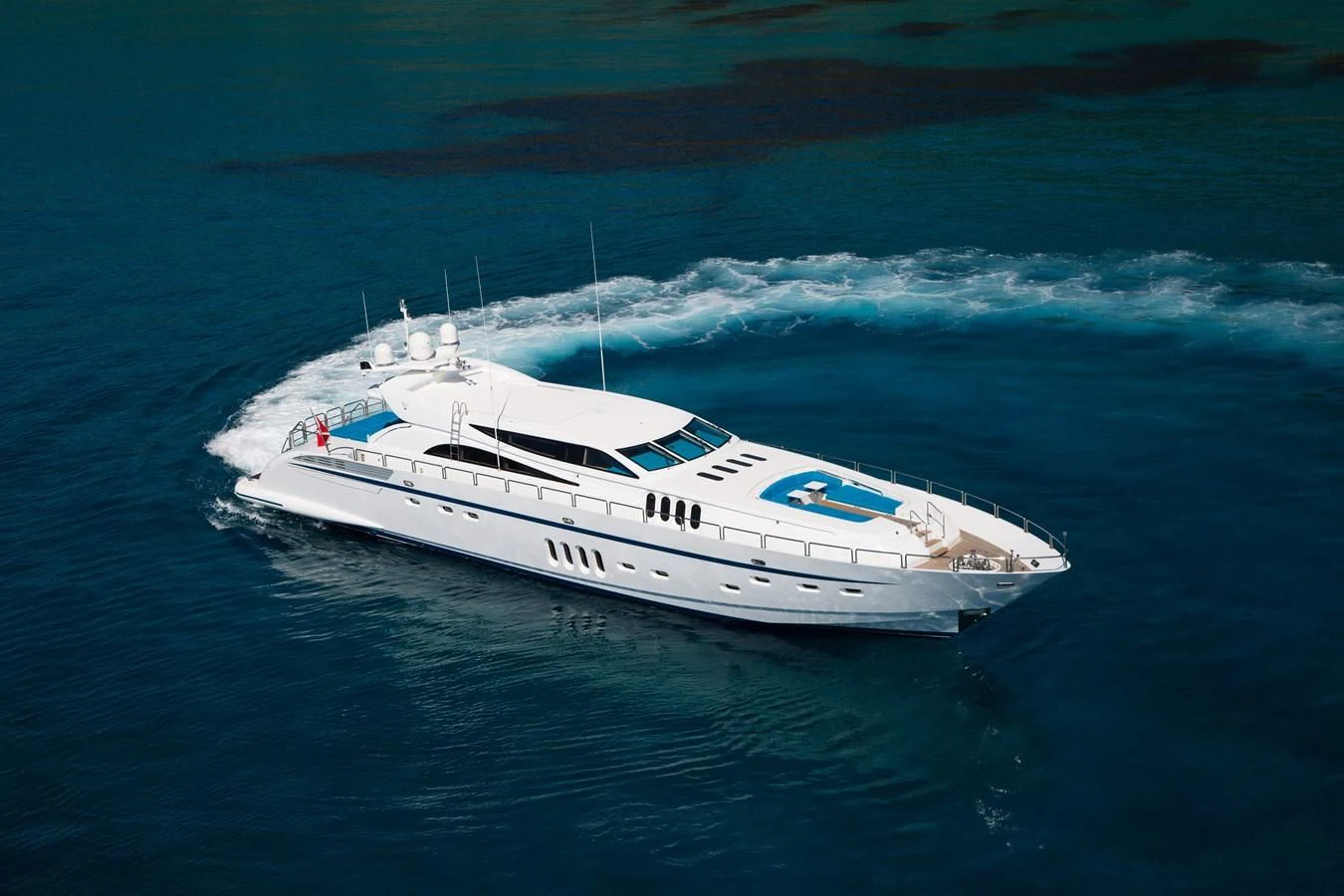 a white boat in the water aboard KIDI ONE Yacht for Sale