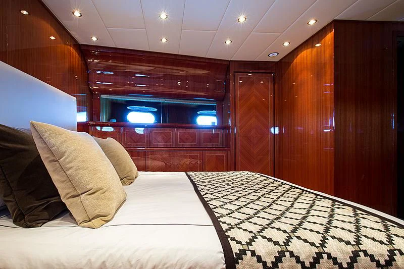a bed in a room aboard KIDI ONE Yacht for Sale