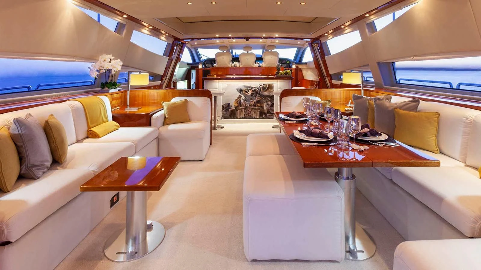 a room with a table and chairs aboard KIDI ONE Yacht for Sale