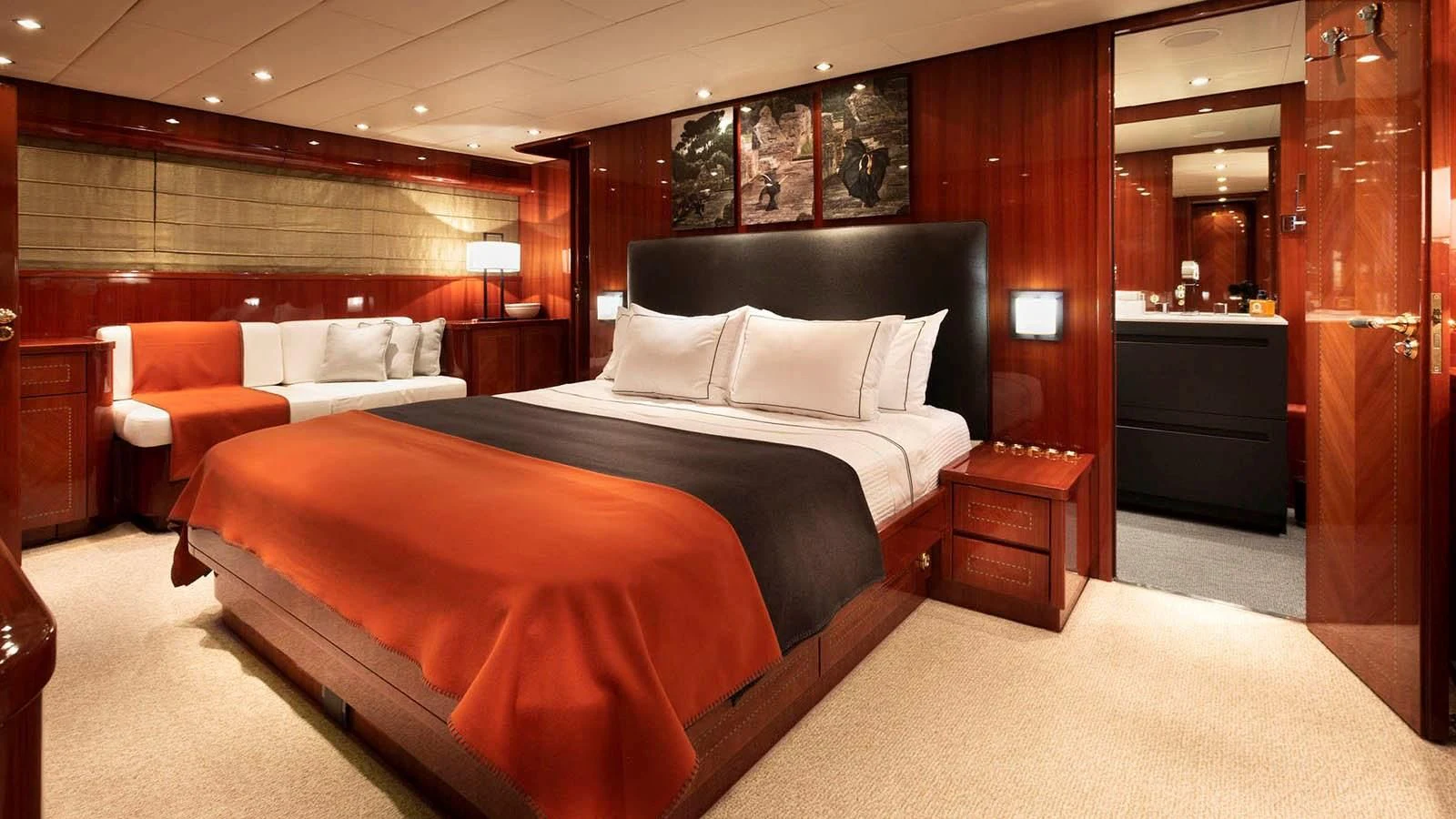 a room with a bed and a couch aboard KIDI ONE Yacht for Sale