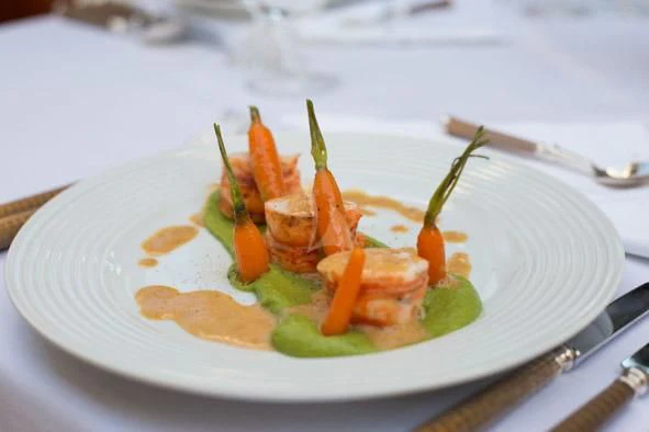 a plate of food aboard KIDI ONE Yacht for Sale