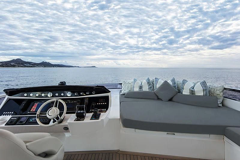 a boat with a large boat on it aboard BRAVA Yacht for Sale