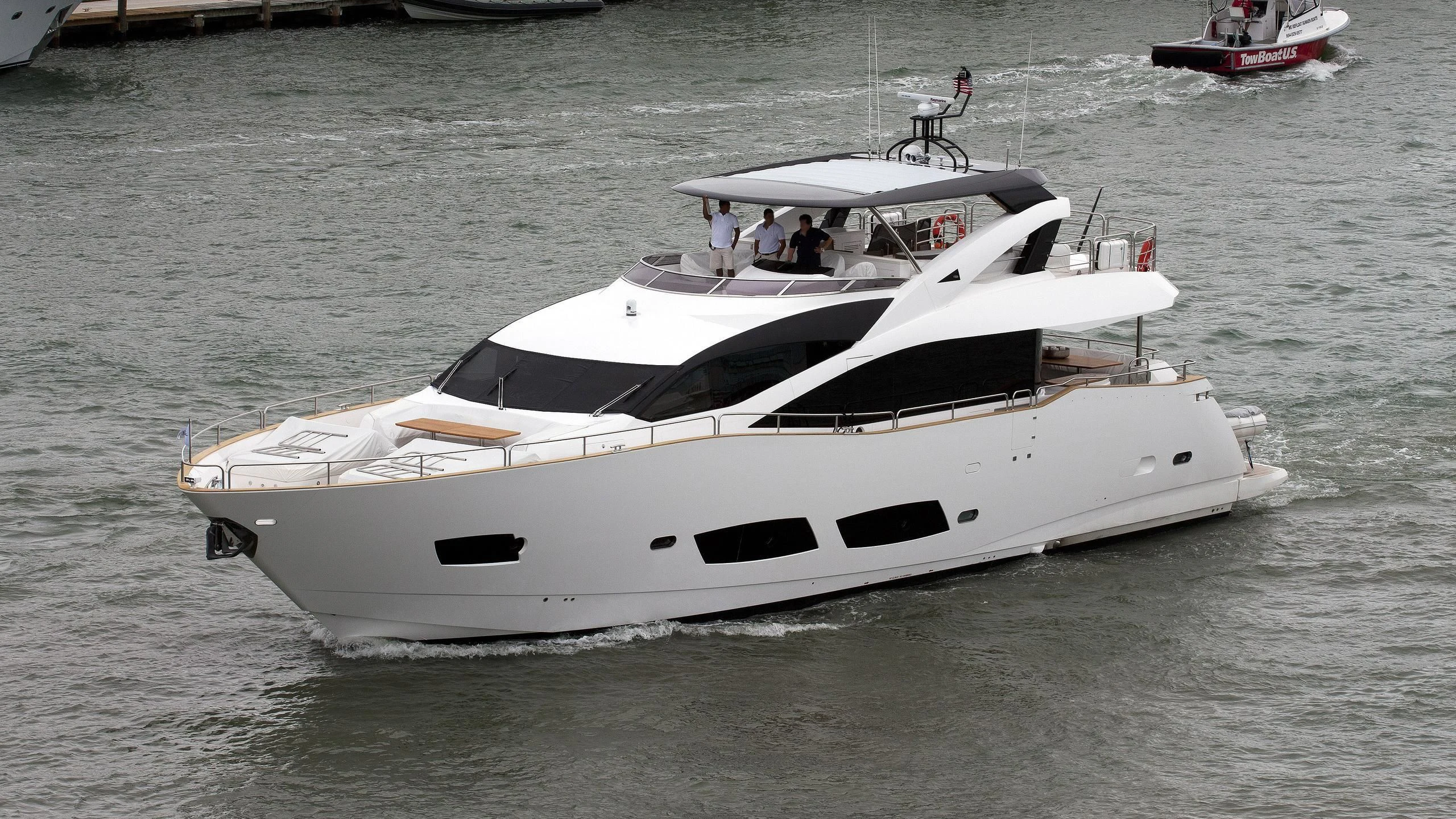 a white boat on the water aboard BRAVA Yacht for Sale