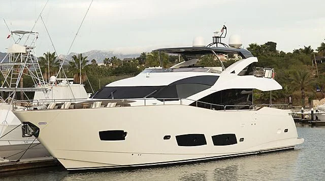 a white yacht in the water aboard BRAVA Yacht for Sale