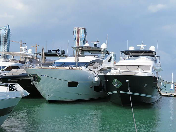 several boats docked in a harbor aboard BRAVA Yacht for Sale