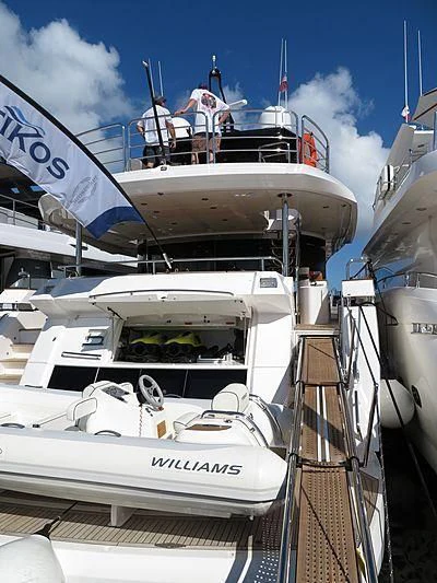a boat with a group of people on it aboard BRAVA Yacht for Sale