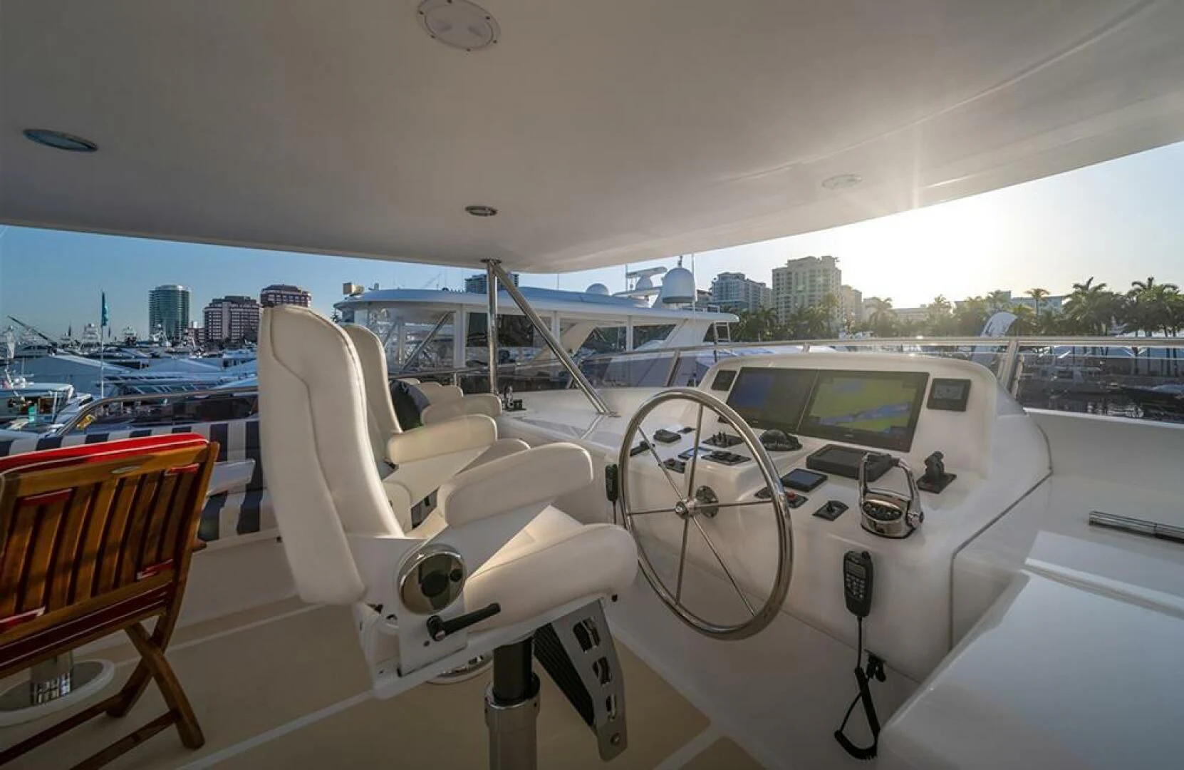a white car on a deck aboard JULIANNE Yacht for Sale