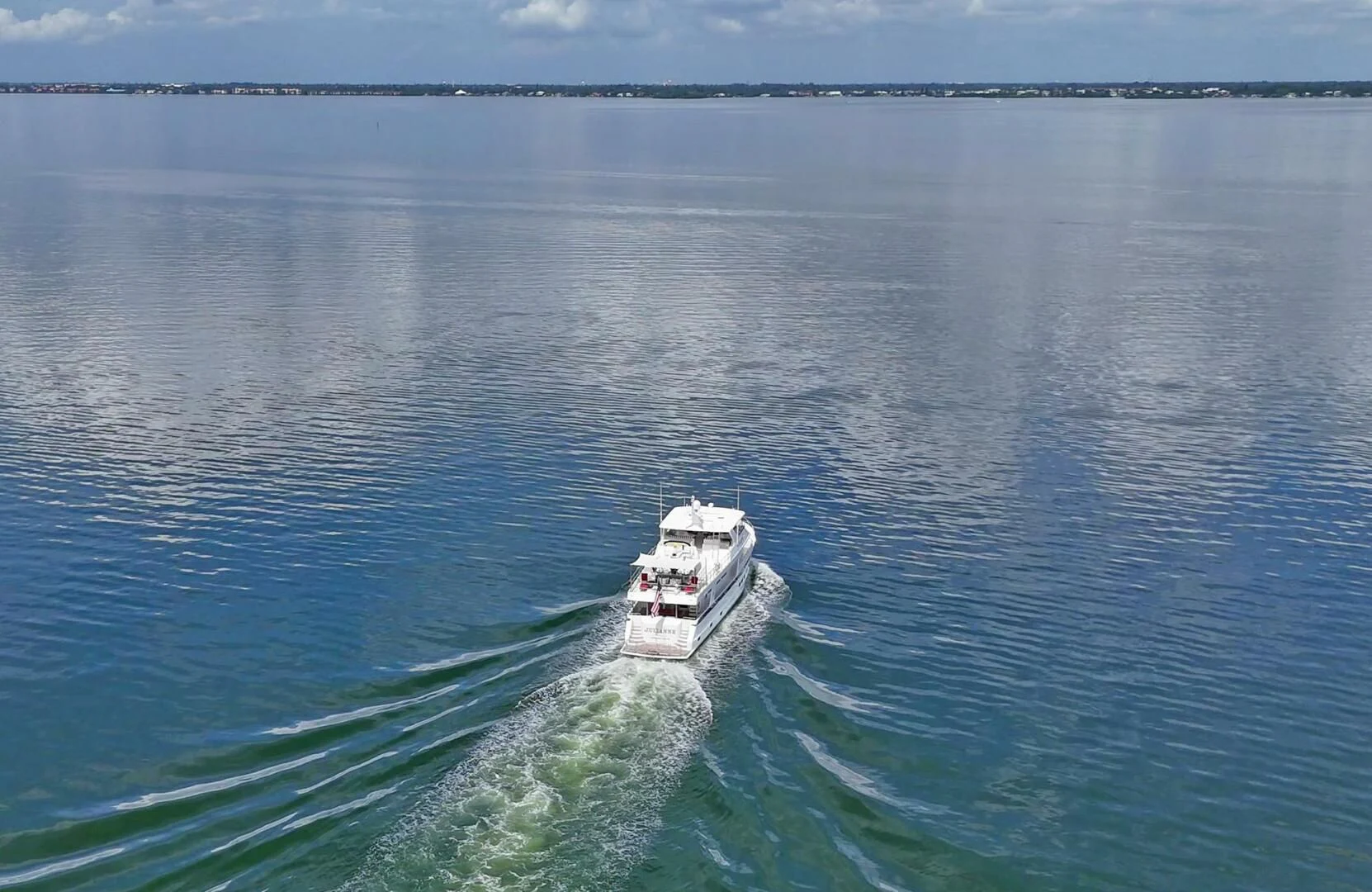 a boat sailing on the water aboard JULIANNE Yacht for Sale