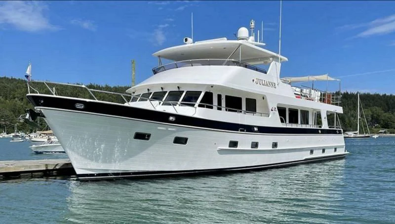 a white yacht on the water aboard JULIANNE Yacht for Sale