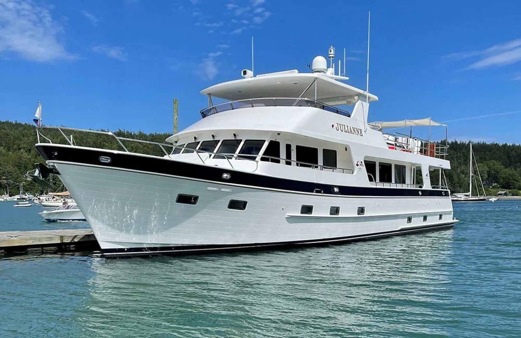 a white boat on the water aboard JULIANNE Yacht for Sale