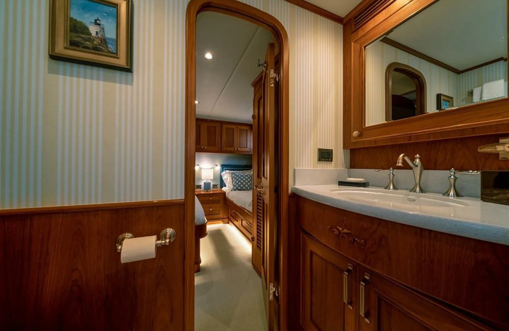 a bathroom with a sink and a mirror aboard JULIANNE Yacht for Sale
