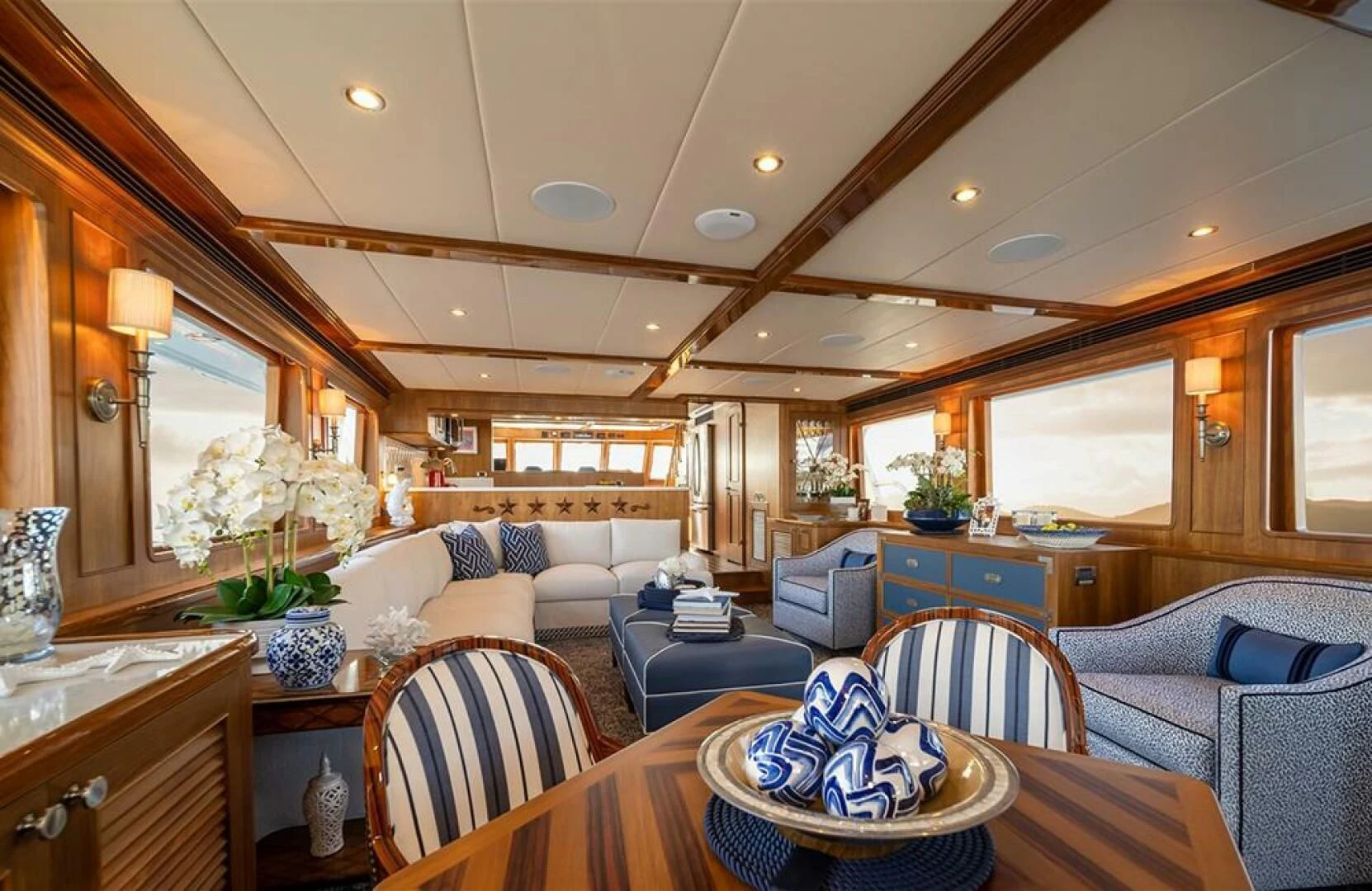 a large living room with a large open window aboard JULIANNE Yacht for Sale