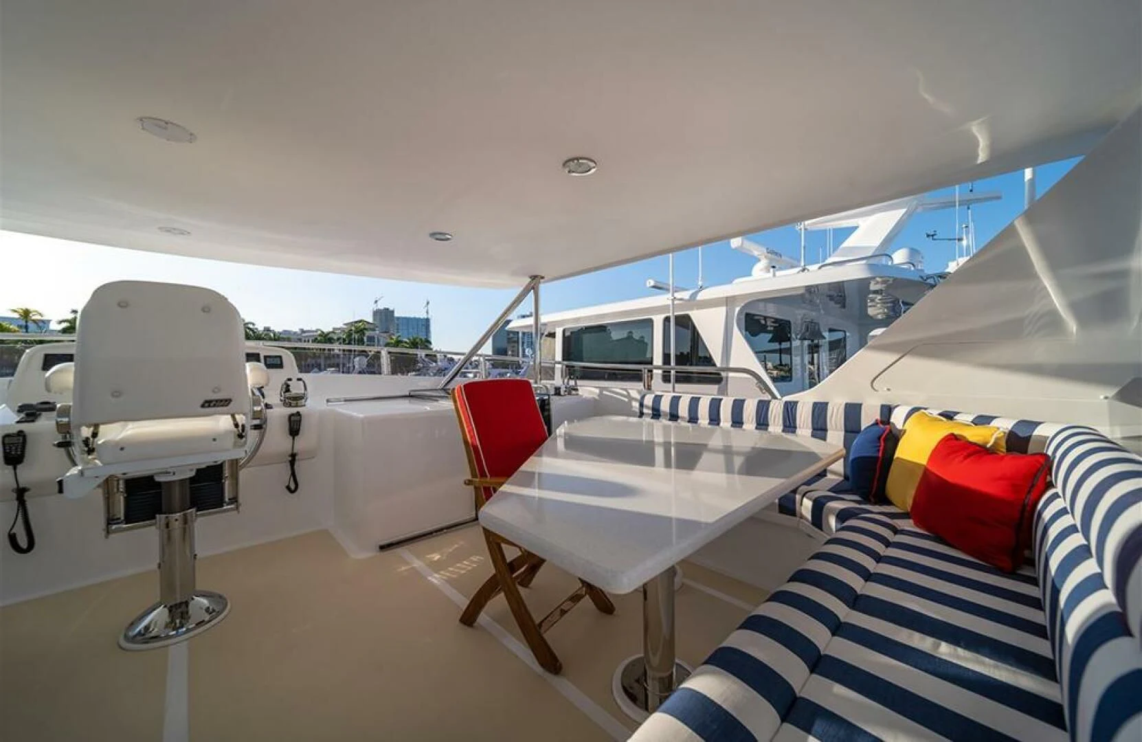 a boat with a chair on the deck aboard JULIANNE Yacht for Sale
