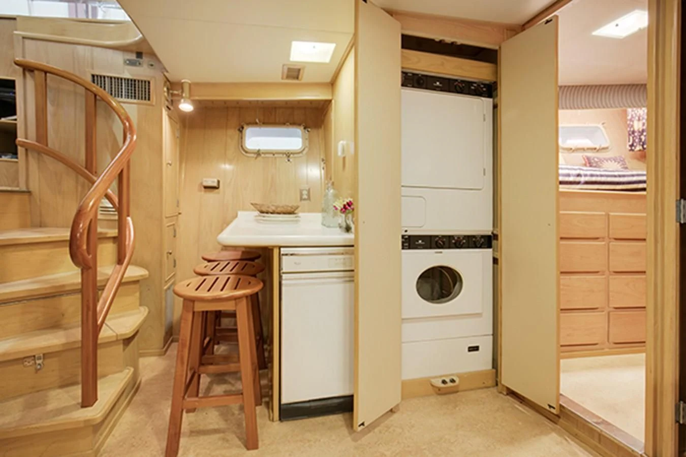 a kitchen with a fridge and a microwave aboard EXCALIBUR Yacht for Sale