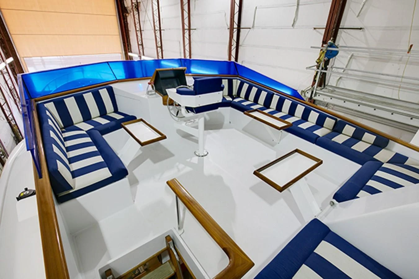 a large white and blue model ship aboard EXCALIBUR Yacht for Sale