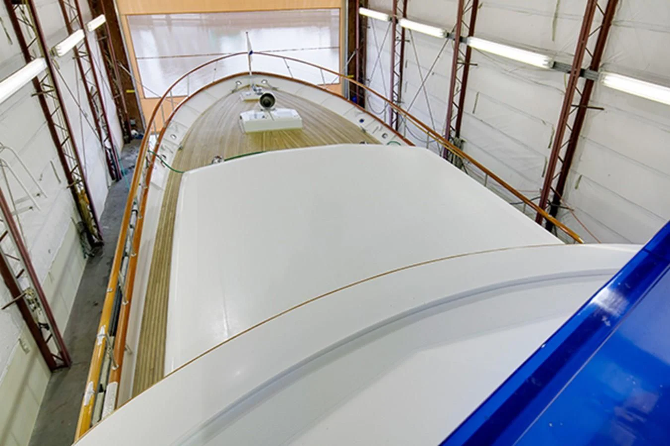 a large white room with a slide aboard EXCALIBUR Yacht for Sale