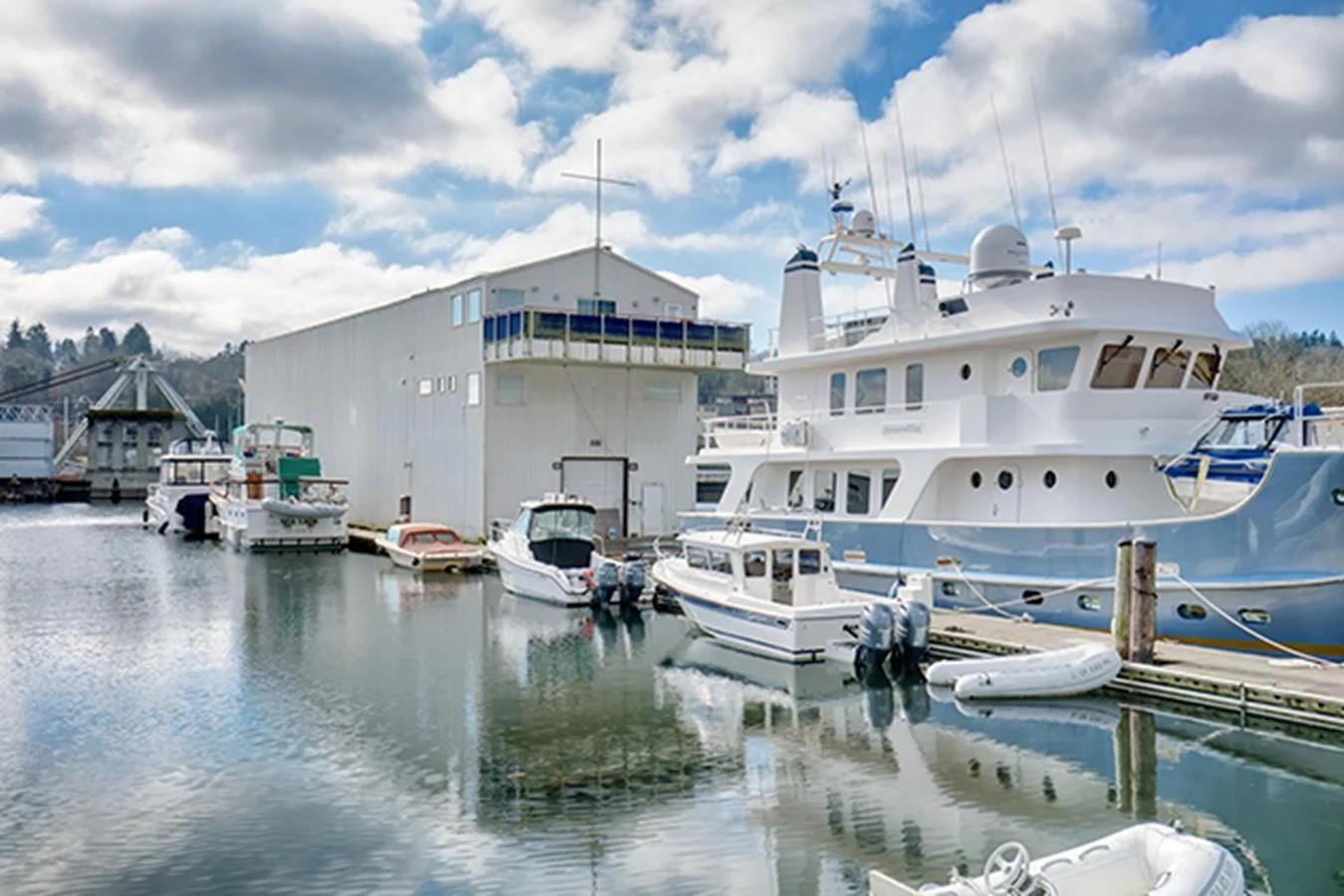 a group of boats are parked in a harbor aboard EXCALIBUR Yacht for Sale