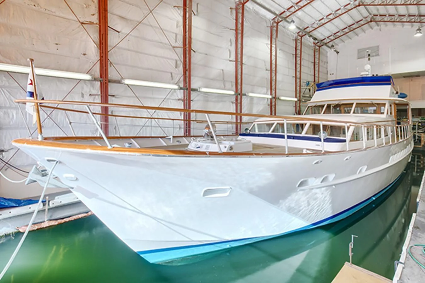 a row of boats in a building aboard EXCALIBUR Yacht for Sale