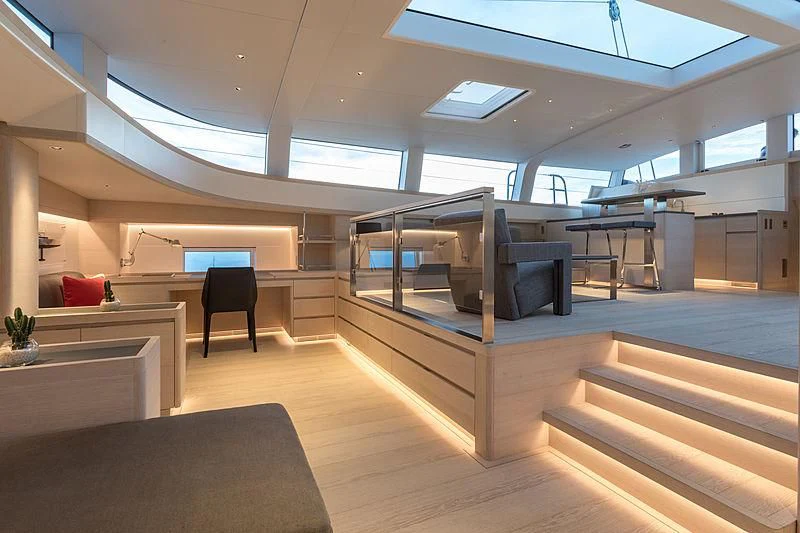 a room with a couch and a tv aboard CERVO Yacht for Sale