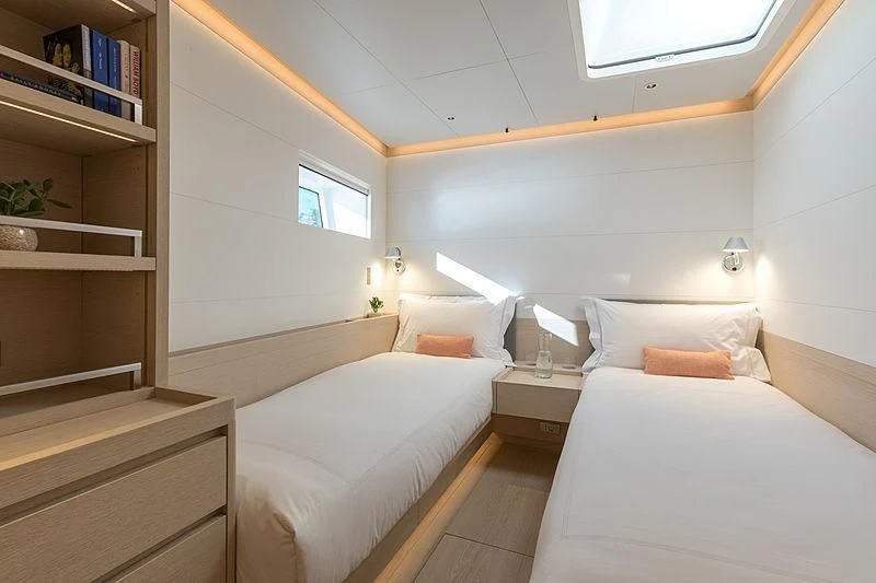 a room with two beds aboard CERVO Yacht for Sale