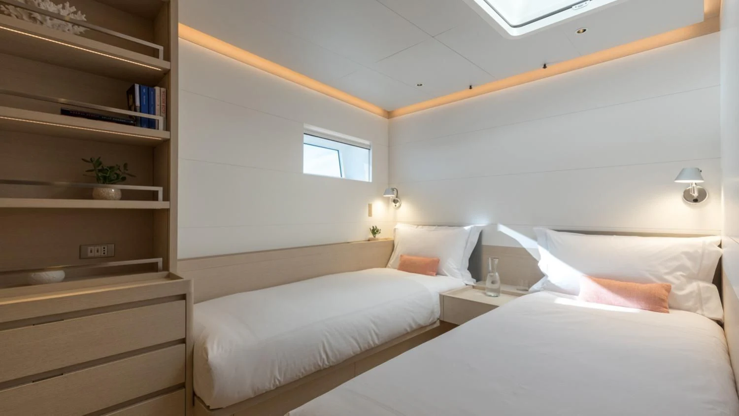 a room with two beds aboard CERVO Yacht for Sale