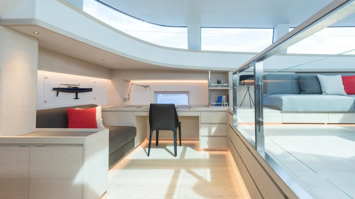 a room with a couch and a table aboard CERVO Yacht for Sale