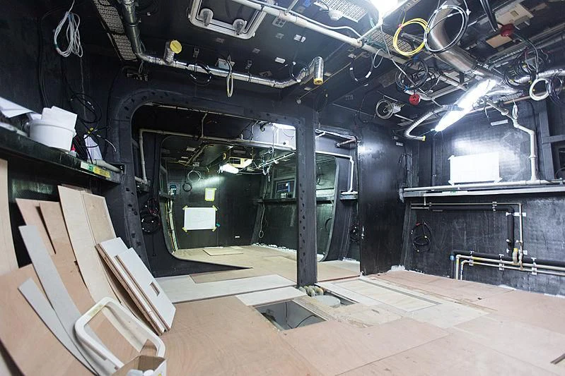 a room with a machine aboard CERVO Yacht for Sale