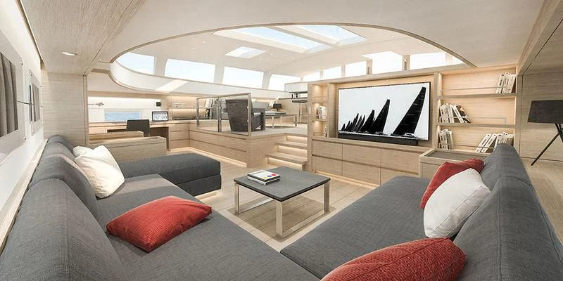 a living room with a large screen aboard CERVO Yacht for Sale