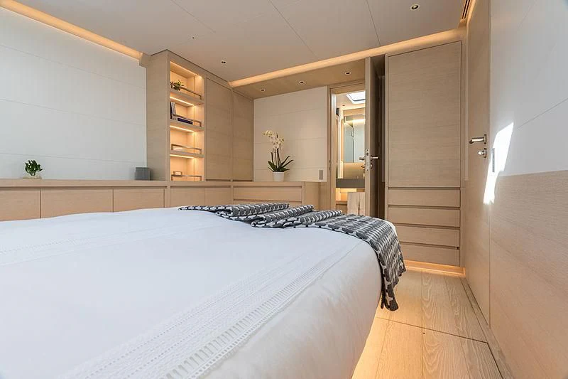 a room with two beds aboard CERVO Yacht for Sale